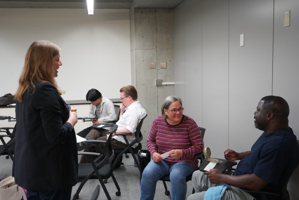 Ms. Sarah Belousov from the U.S. Embassy in Japan presents to Lakeland University Japan students and Professor Ruth Lionberger