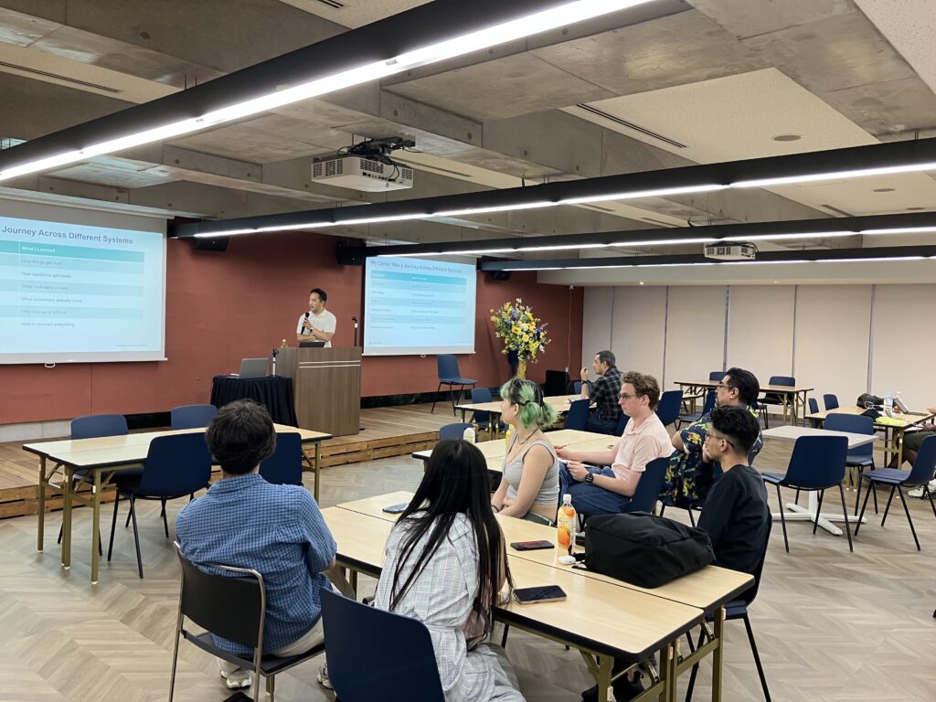 Mr. Hiro Iwashima presents to LUJ graduate students.