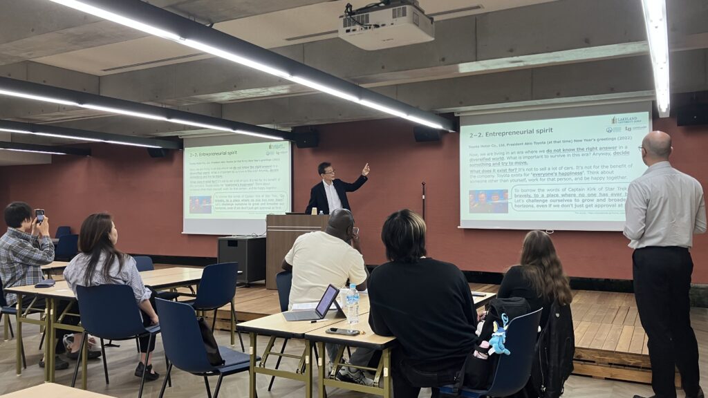 Mr. Makato Noda presents to LUJ students.