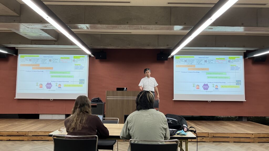 Dr. Manabu Sawaguchi presents to LUJ students.
